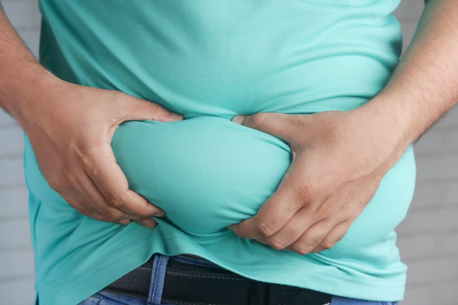 A man holding his stomach